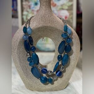 Blue stone bead necklace.